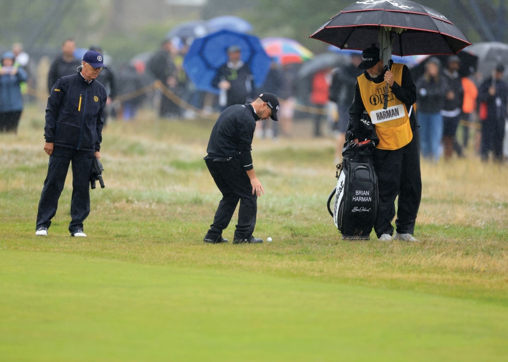 Helping Brian Harman at Hoylake in the 2023 Open final round. Photos courtesy of Dave Cannon.