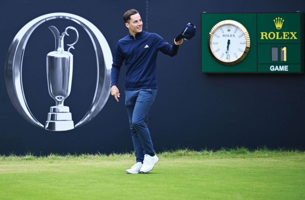 To a rapturous reception despite the unearthly hour, home hero Matthew Jordan strides into the first tee arena at 6.31am to hit the opening tee shot of the 151st Open. How on earth did he remain calm with most of the gallery shouting his name?