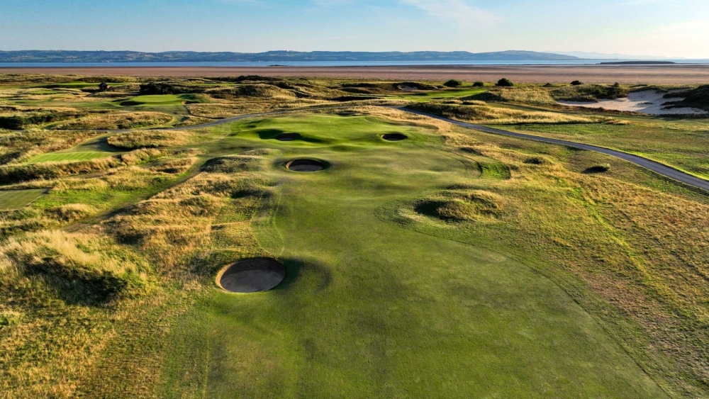 Threading a drive on this par 5 between the gorse to the left and the strategically positioned bunkers on the right, most players should look to play their second shots to the right side of the fairway from where they will get the best angle of approach to a two tier green. Be careful to check the pin position. Should you end up on the wrong part of the green, two putts will be a challenge.