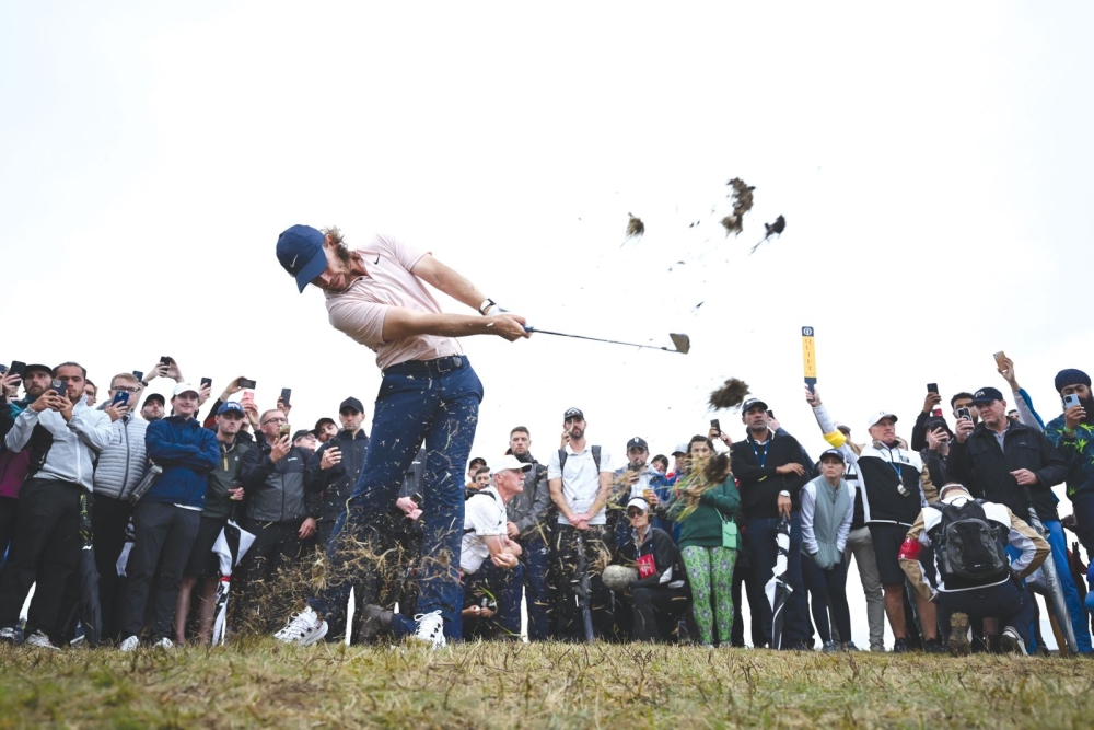Local favourite Tommy Fleetwood keeps his eye on the ball whilst reshaping the rough on the left of Hoylake’s 16th hole during round 3. Look at his finish!